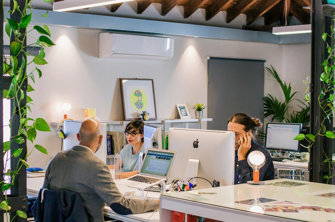 open office space with happy workers